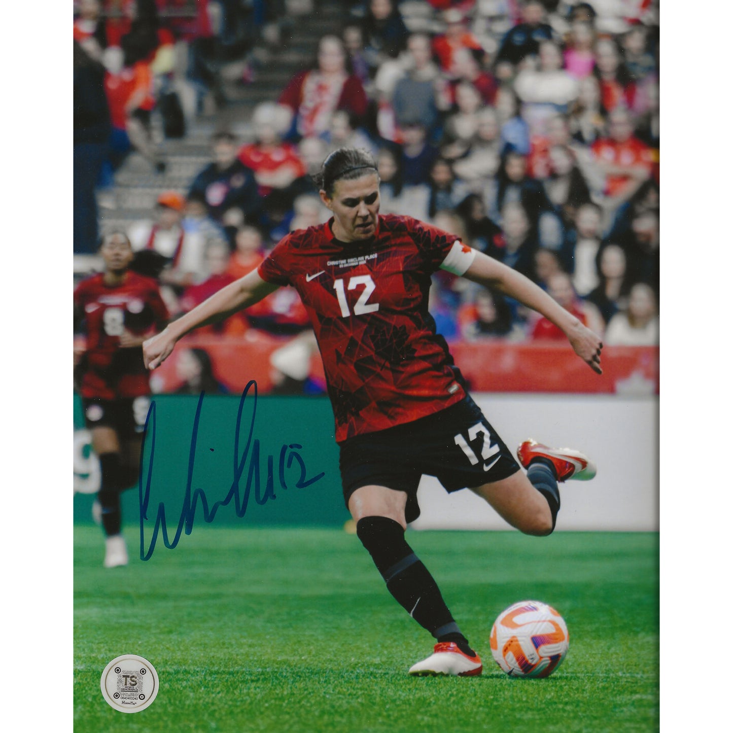 Christine Sinclair Autographed Canada Women's National Team Kicking 8x10