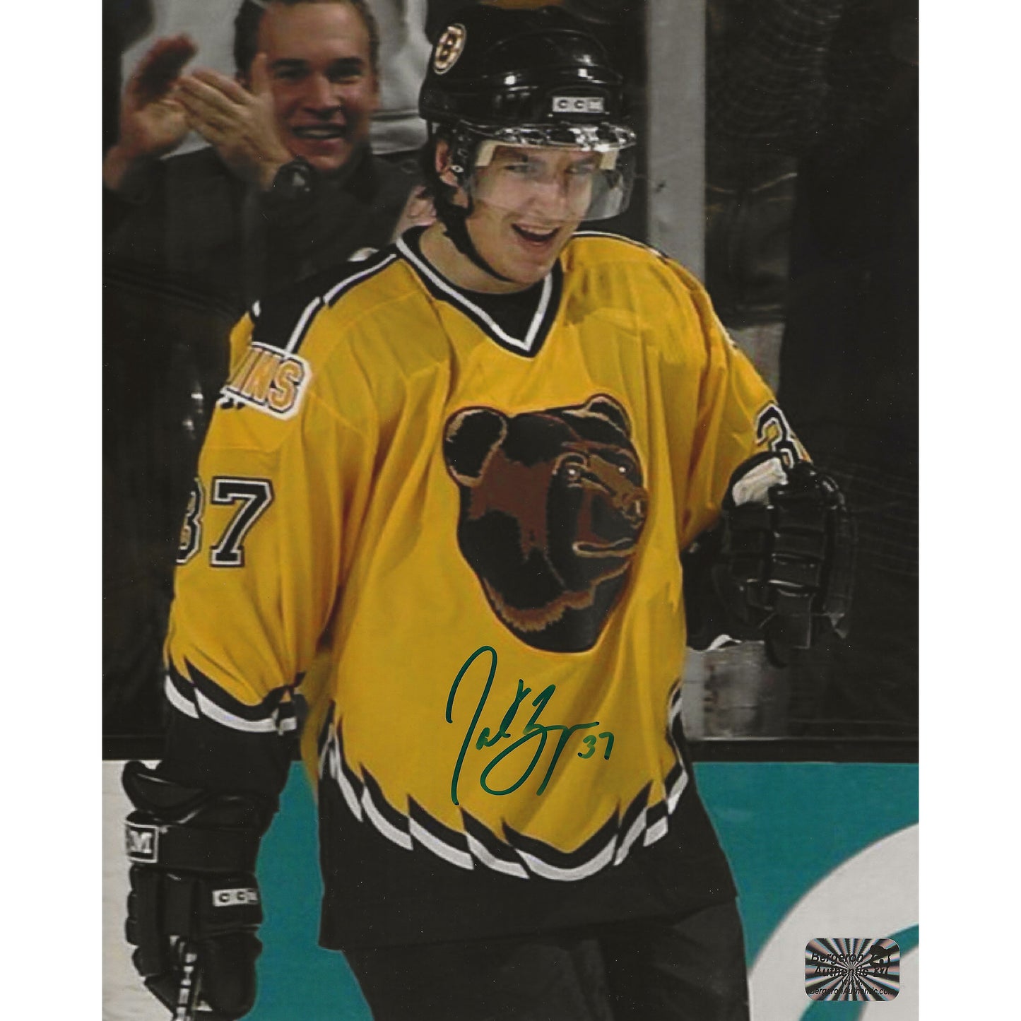 Patrice Bergeron Autographed Boston Bruins Pooh Bear 8x10 Photo