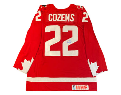Dylan Cozens Autographed Team Canada Heritage Red Nike Jersey