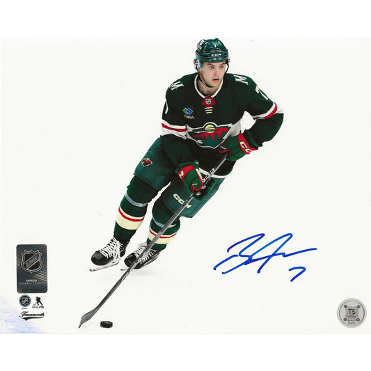 Brock Faber Autographed Minnesota Wild Skating w/ Puck 8x10 Photo
