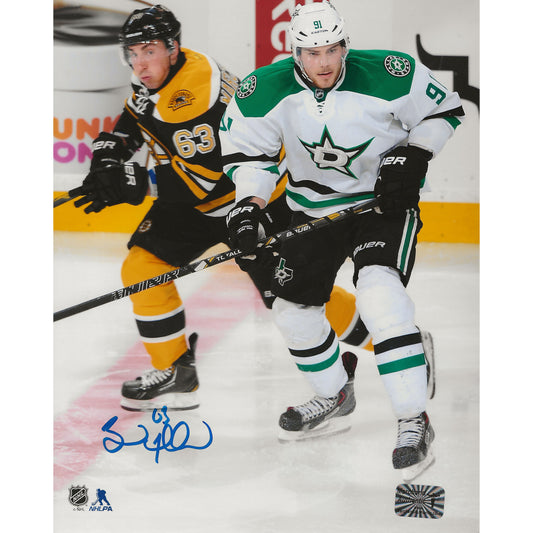 Brad Marchand Autographed Boston Bruins Puck Battle 8x10 Photo