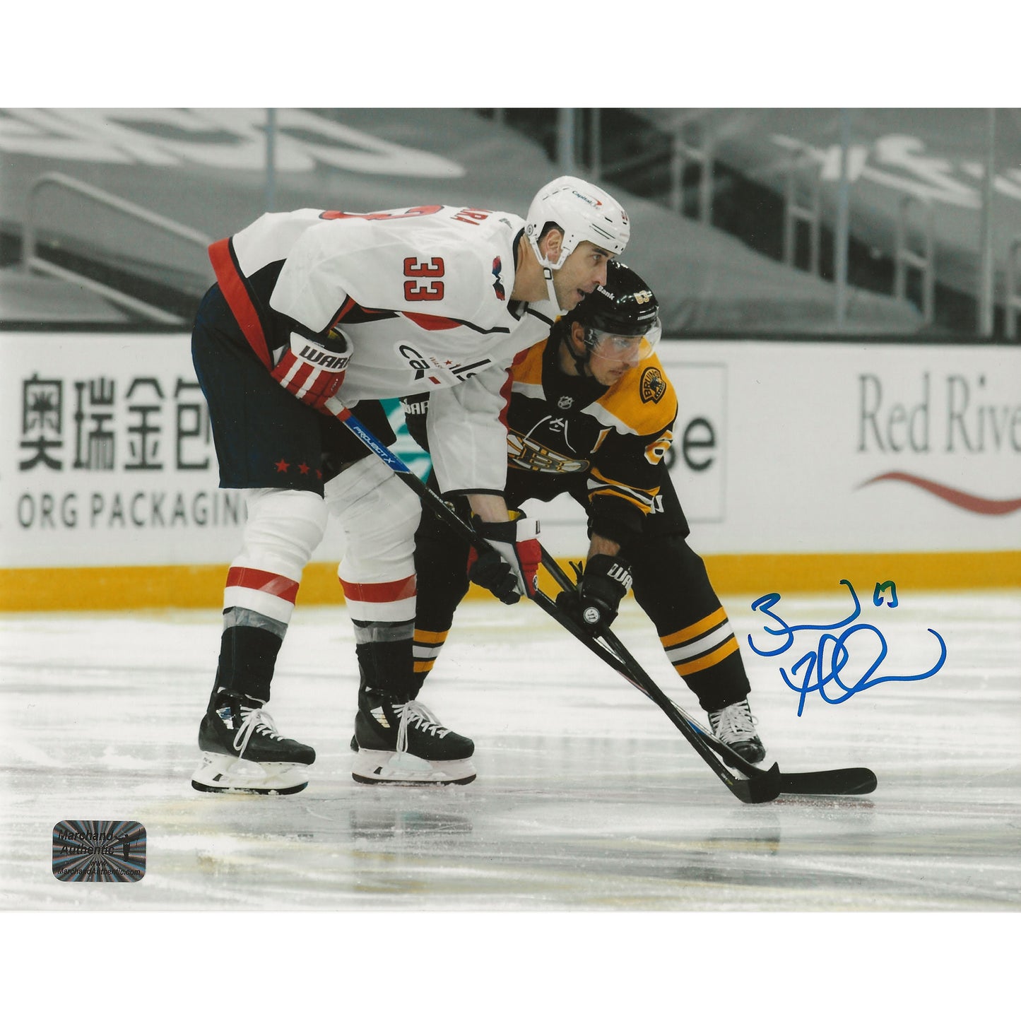 Brad Marchand Autographed Boston Bruins Face-off 8x10 Photo